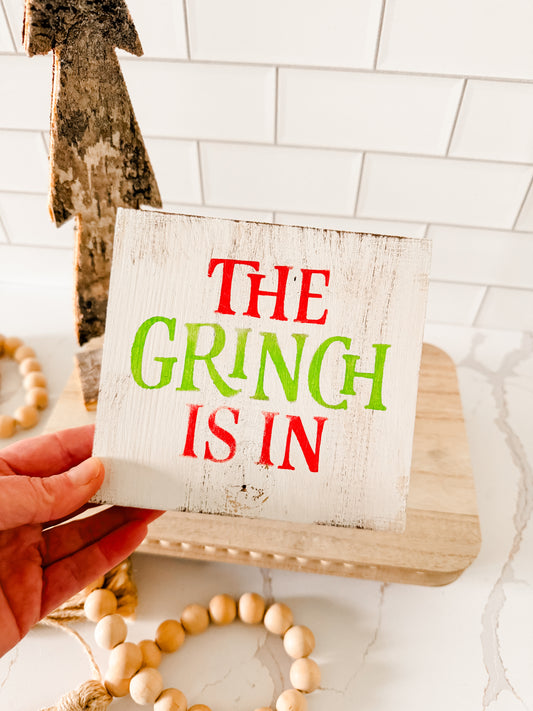 The Grinch Is In Wood Sign