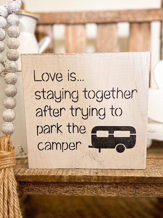Love is parking the camper sign